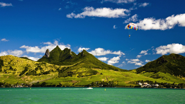 Kite flying water mountains boat free wallpaper for desktop - medium preview image