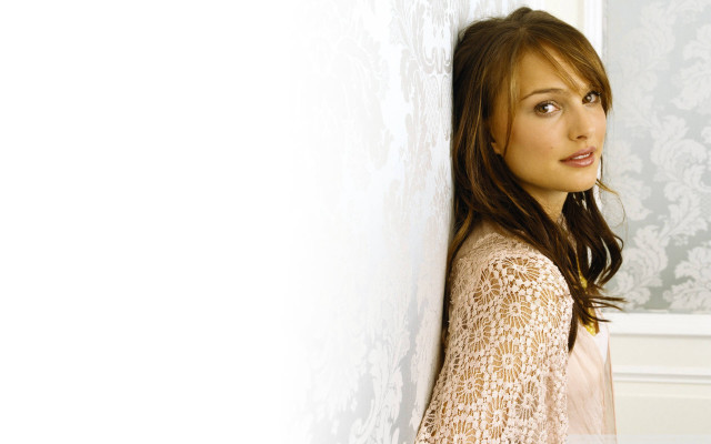 Woman leaning wall smiling looking free wallpaper for desktop - medium preview image