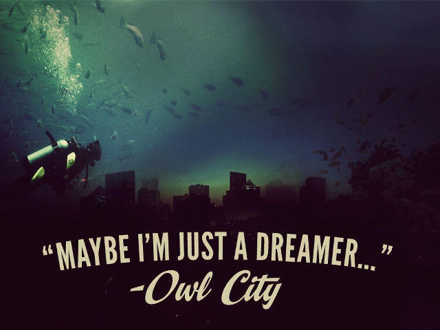Scuba diver city background quote free wallpaper for desktop - medium preview image