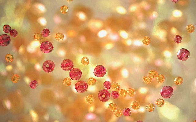 Red yellow beads floating blurry free wallpaper for desktop - medium preview image