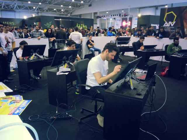 Man sitting desk laptop room free wallpaper for desktop - medium preview image