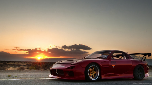 Red sports car sunset road #2 free wallpaper for desktop - medium preview image