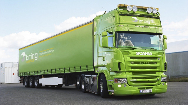 Green semi truck parking lot free wallpaper for desktop - medium preview image