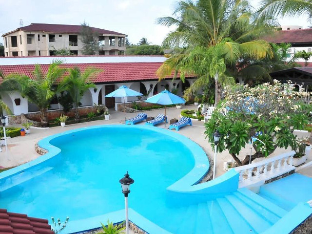 Large swimming pool chairs umbrellas free wallpaper for desktop - medium preview image