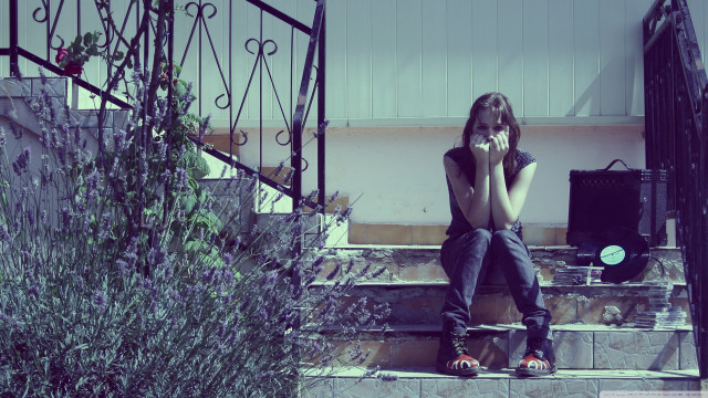 Woman sitting stairs hands face free wallpaper for desktop - medium preview image