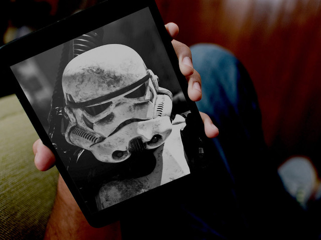 Person holding tablet storm trooper free wallpaper for desktop - medium preview image