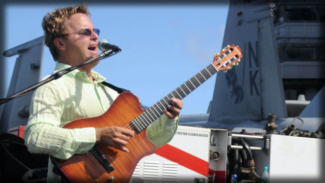 Man playing guitar microphone plane free wallpaper for desktop - medium preview image