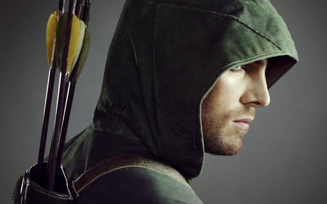 Man hoodie bow arrow serious free wallpaper for desktop - medium preview image