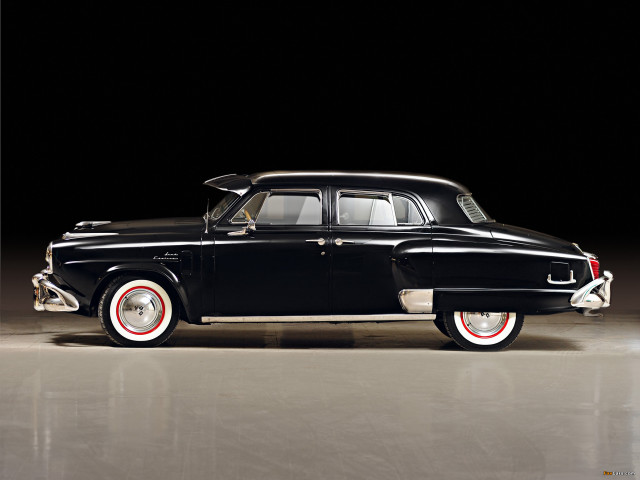 Black car red rims dark free wallpaper for desktop - medium preview image