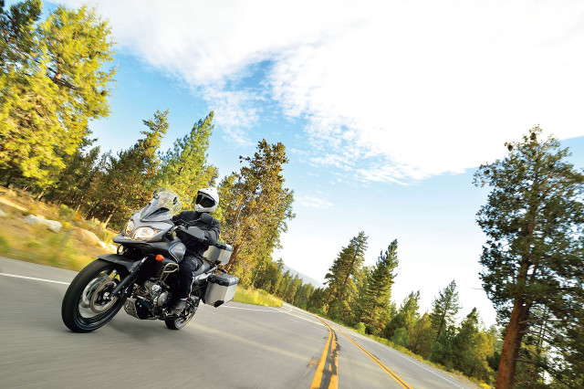 Motorcycle road trees hill sky free wallpaper for desktop - medium preview image