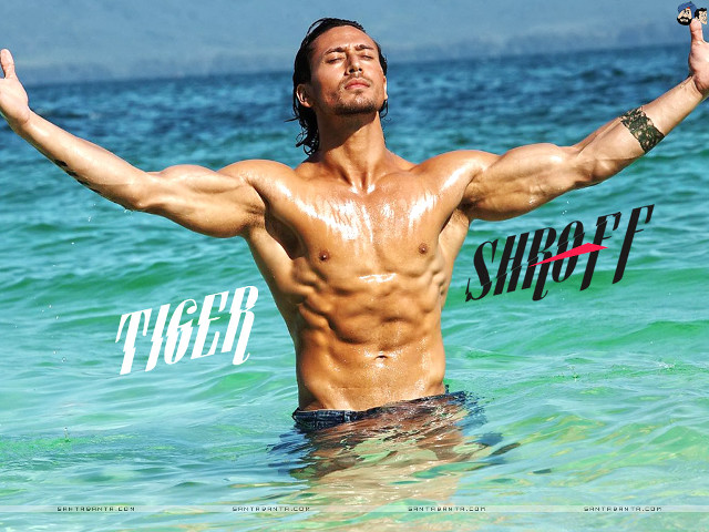 Man standing ocean arms outstretched free wallpaper for desktop - medium preview image