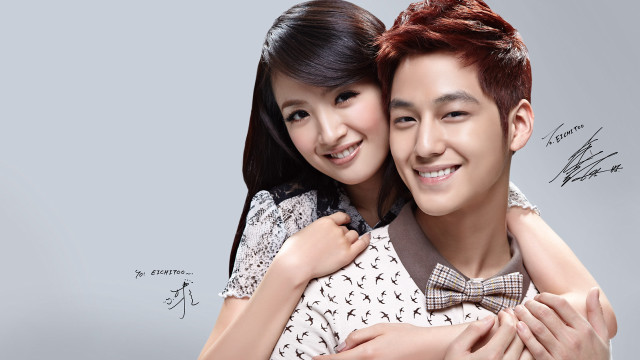 Man woman hugging smiling gray free wallpaper for desktop - medium preview image