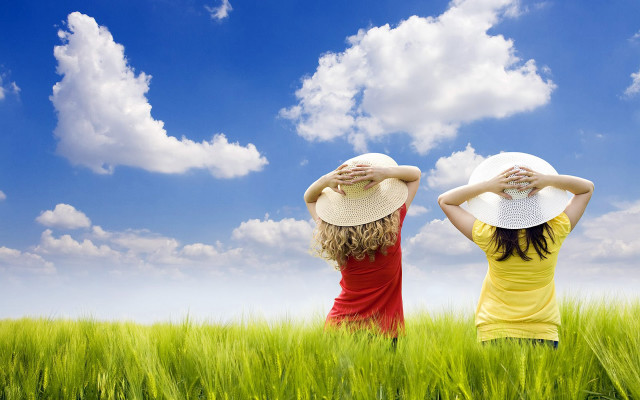 Two women yellow shirts hats #2 free wallpaper for desktop - medium preview image