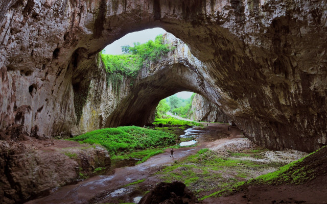 Cave stream walking person distance free wallpaper for desktop - medium preview image