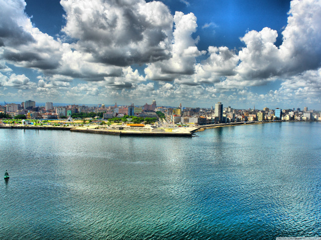 Water city clouds person green free wallpaper for desktop - medium preview image