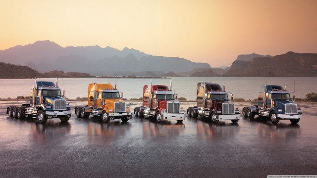 Semi trucks lake mountains parking free wallpaper for desktop - medium preview image