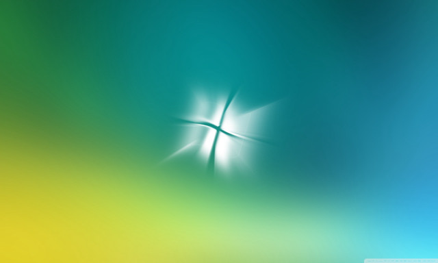 Blurry cross blue green yellow free wallpaper for desktop - medium preview image
