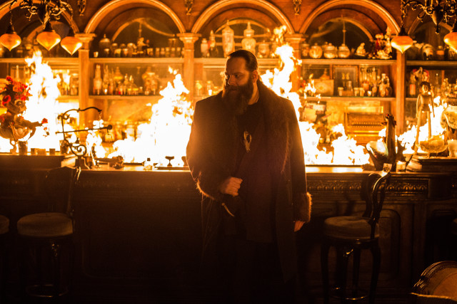 Man standing bar fire background free wallpaper for desktop - medium preview image