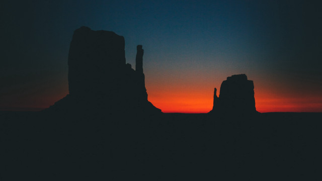 Sunset silhouette rock formation orange free wallpaper for desktop - medium preview image