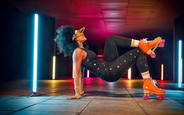 Woman rollerblading neon crown kitsch free wallpaper for desktop - medium preview image