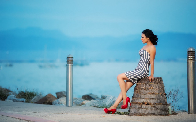 Woman sitting post water boats free wallpaper for desktop - medium preview image