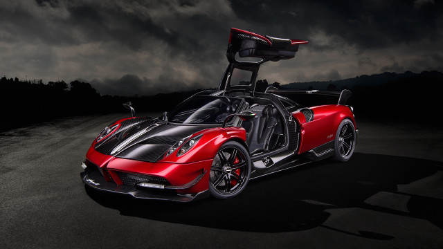 Red sports car dark road free wallpaper for desktop - medium preview image