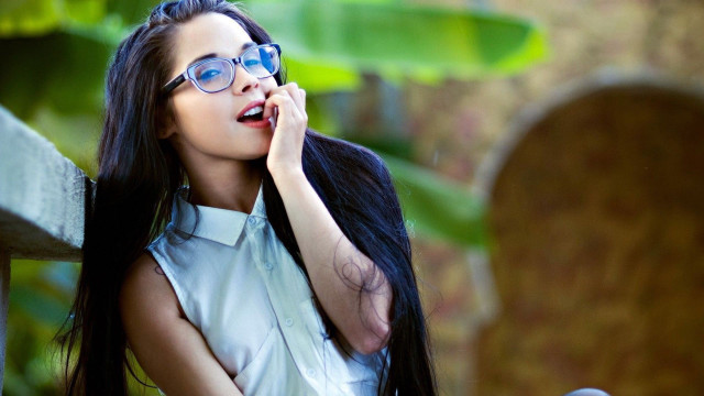Woman long hair glasses cell free wallpaper for desktop - medium preview image