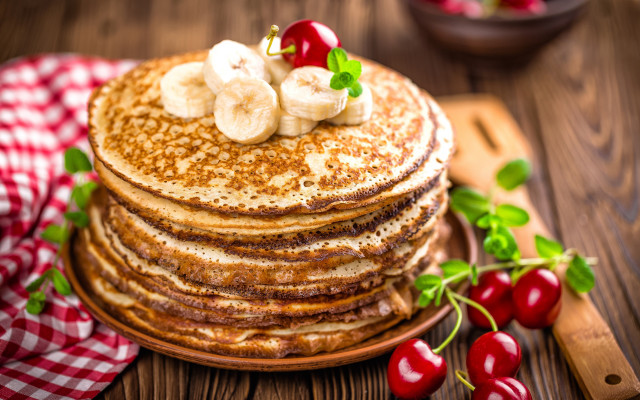 Pancakes bananas cherries wooden table free wallpaper for desktop - medium preview image