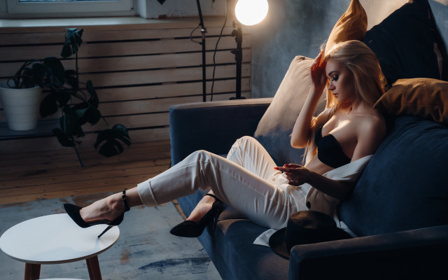 Woman sitting couch blonde highheels free wallpaper for desktop - medium preview image