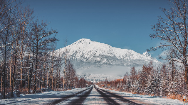 Snowy road mountains trees blue free wallpaper for desktop - medium preview image