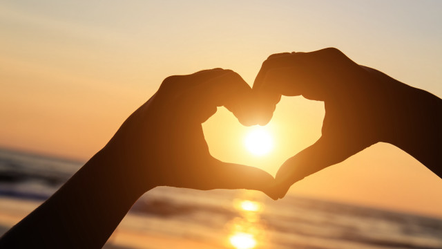 Beach sunset heart hands silhouette free wallpaper for desktop - medium preview image