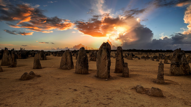 Sunset desert rocks clouds horizon free wallpaper for desktop - medium preview image