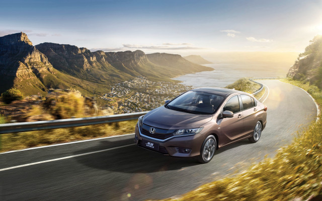 Mountain ocean road car sunset free wallpaper for desktop - medium preview image