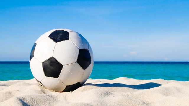 Soccer ball beach ocean sunny free wallpaper for desktop - medium preview image