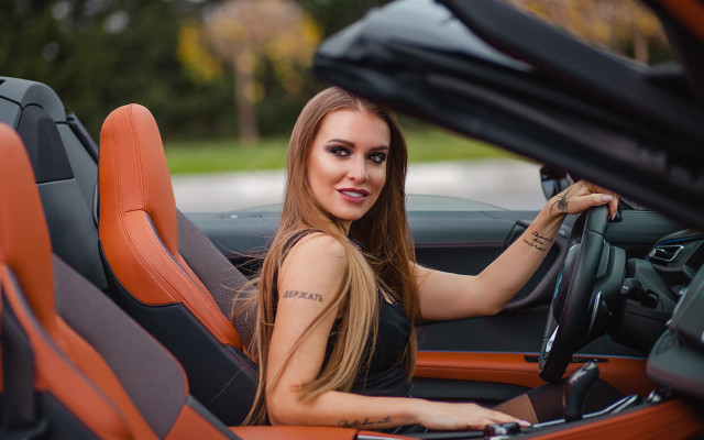 Woman car smile tattoos bokeh free wallpaper for desktop - medium preview image