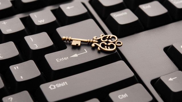 Golden key on keyboard les free wallpaper for desktop - medium preview image