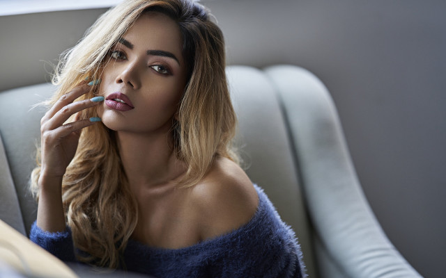 Woman longhair couch blue sweater free wallpaper for desktop - medium preview image