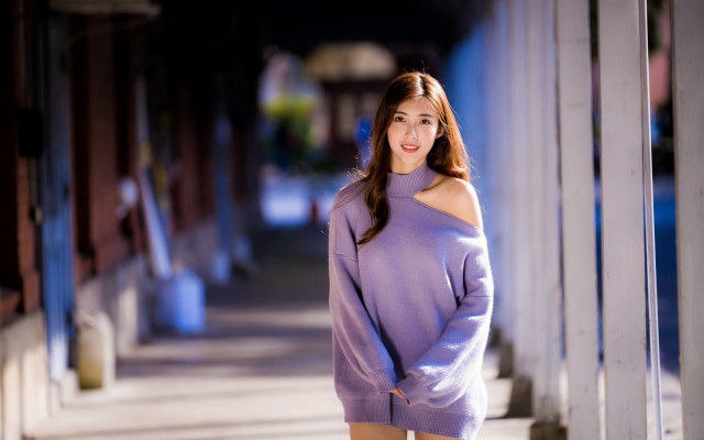 Woman purple sweater sidewalk building free wallpaper for desktop - medium preview image