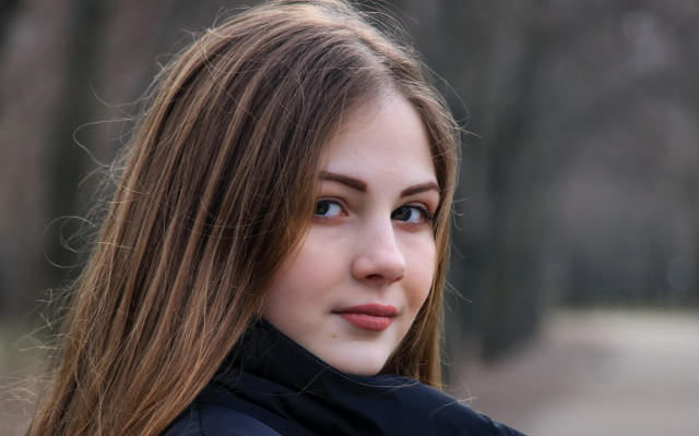 Woman longhair blackjacket serious blueeyes free wallpaper for desktop - medium preview image