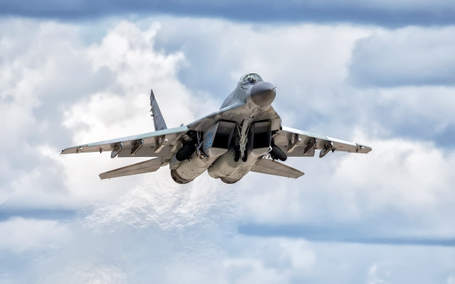 Fighter jet cloudy sky engine free wallpaper for desktop - medium preview image