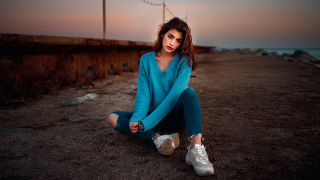 Woman sitting water background portrait free wallpaper for desktop - medium preview image