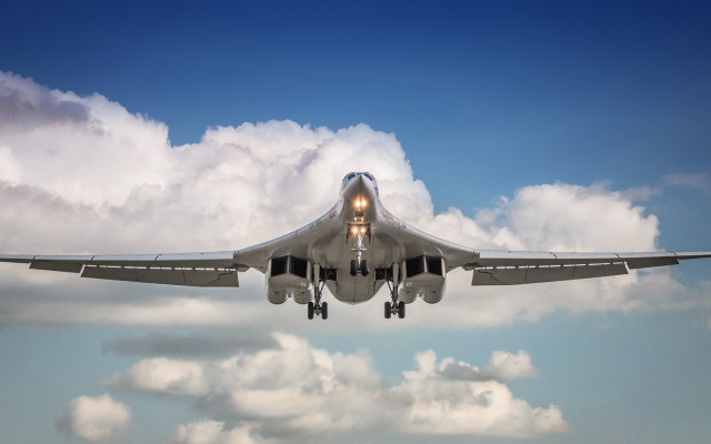 Jet airplane cloudy sky landing free wallpaper for desktop - medium preview image