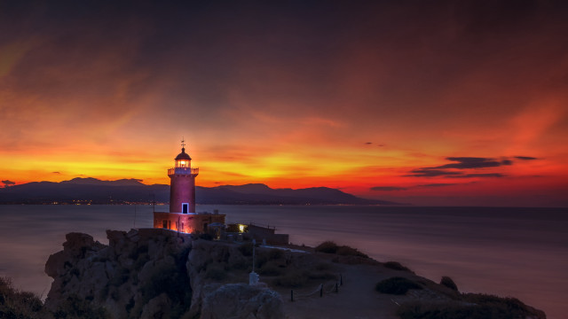 Lighthouse rocky cliff sunset ocean #5 free wallpaper for desktop - medium preview image