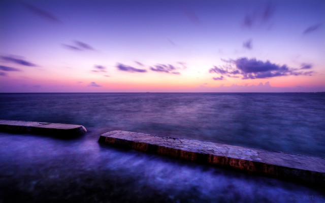 Pier purple sunset clouds city free wallpaper for desktop - medium preview image