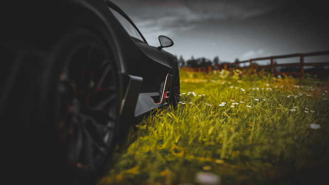 Car field fence sunset blurry free wallpaper for desktop - medium preview image