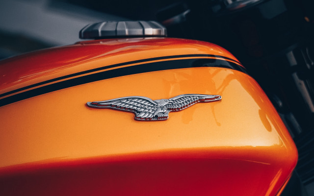 Orange motorcycle winged emblem cloisonnism free wallpaper for desktop - medium preview image
