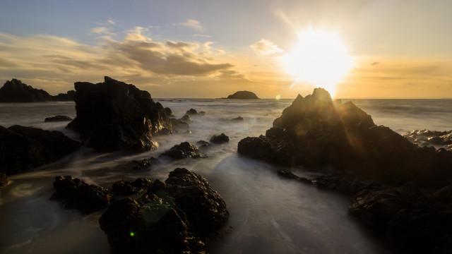 Sunset ocean rocks water islands free wallpaper for desktop - medium preview image