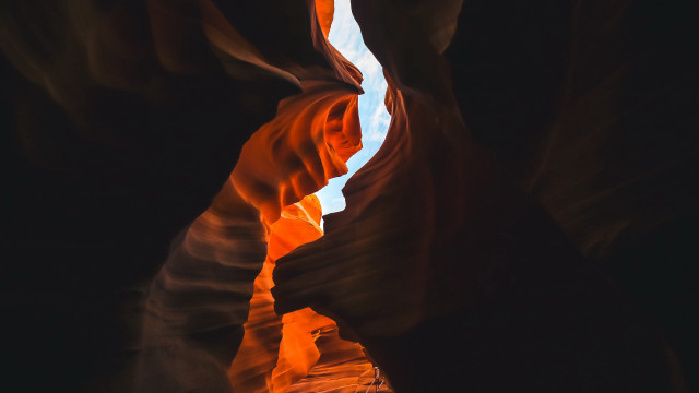 Narrow canyon opening sky light free wallpaper for desktop - medium preview image