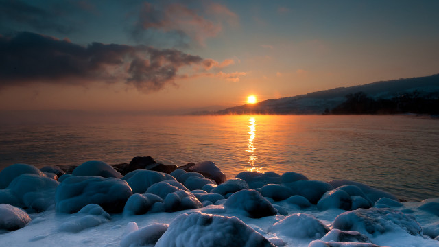 Sunset water snow rocks mountain free wallpaper for desktop - medium preview image