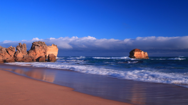 Beach waves rocks clouds sky free wallpaper for desktop - medium preview image
